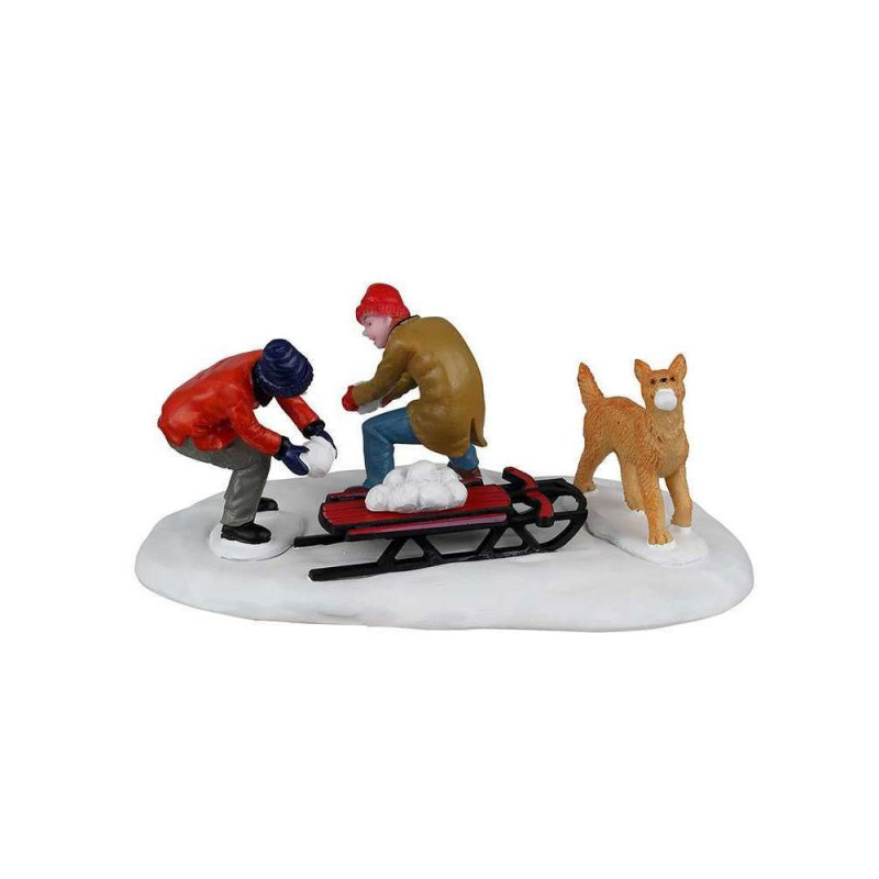 Figurine : Villageois jouant dans la neige avec le